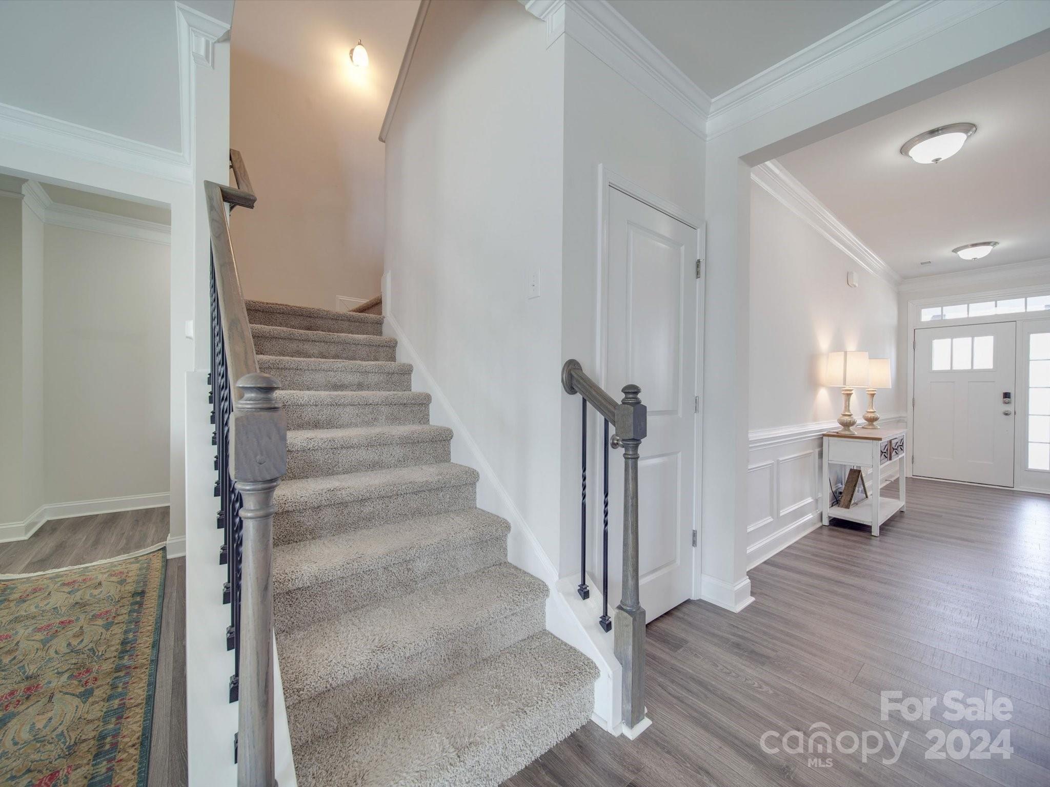 5901 Redwood Pine Road Concord, NC 28027 - Photo 24 of 39 a view of a hallway with wooden floor and entryway