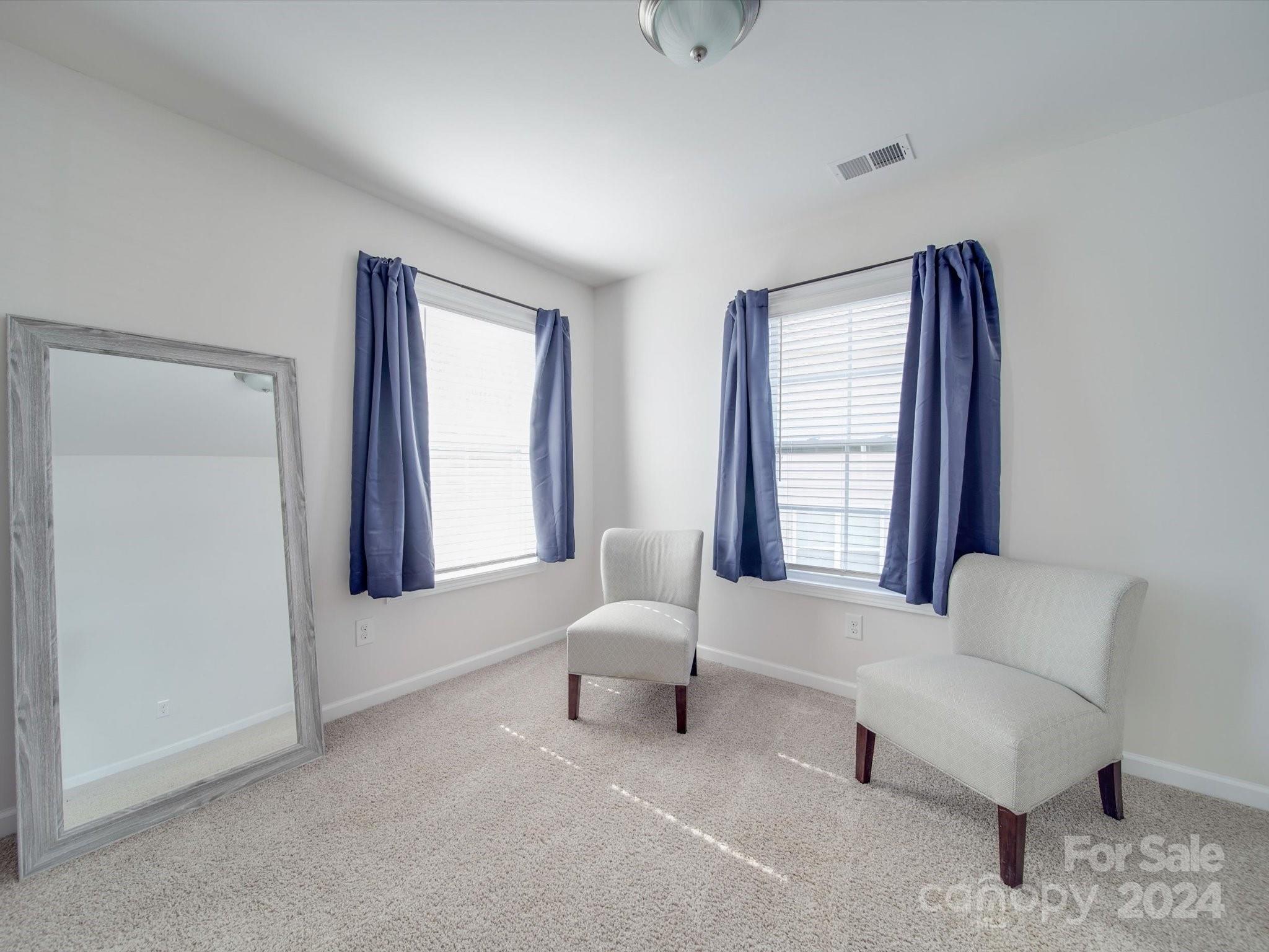 5901 Redwood Pine Road Concord, NC 28027 - Photo 29 of 39 a living room with furniture and a large window