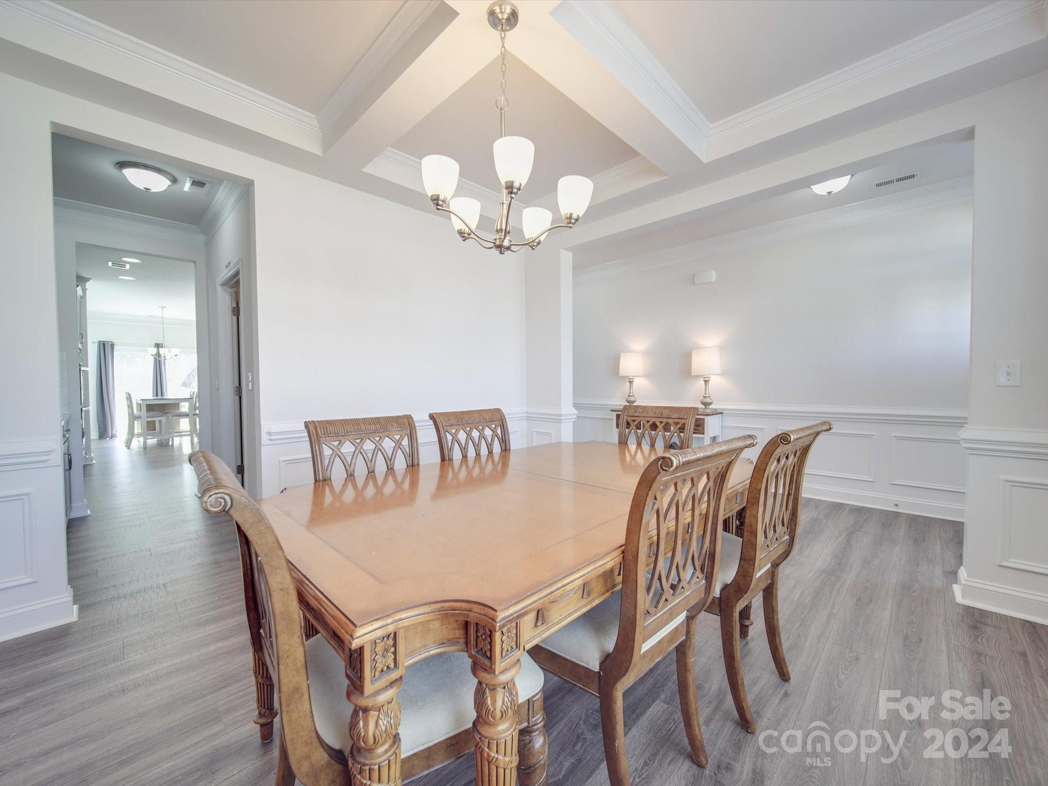 5901 Redwood Pine Road Concord, NC 28027 - Photo 6 of 39 a view of a dining room with furniture and wooden floor