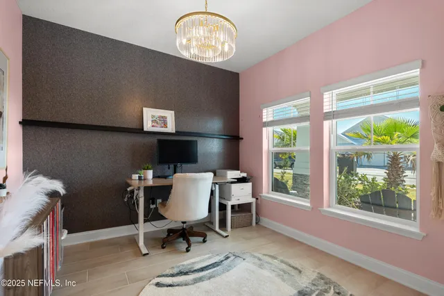 a kitchen with a sink a stove and a refrigerator