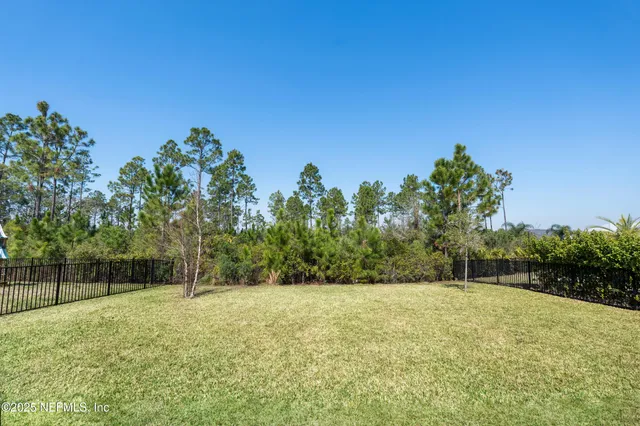a outdoor space with patio furniture and garden