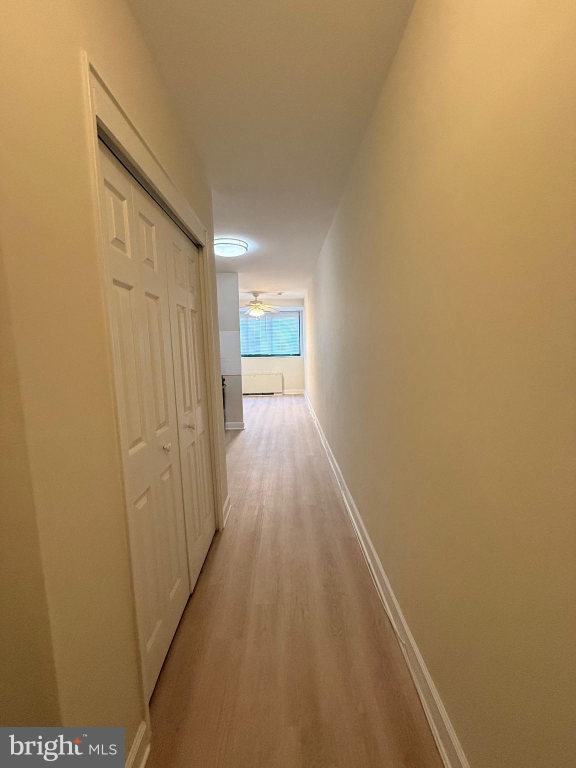 4740 Connecticut Avenue Northwest, Unit 112 Washington, DC 20008 - Photo 15 of 20 Bright and inviting hallway with natural light.