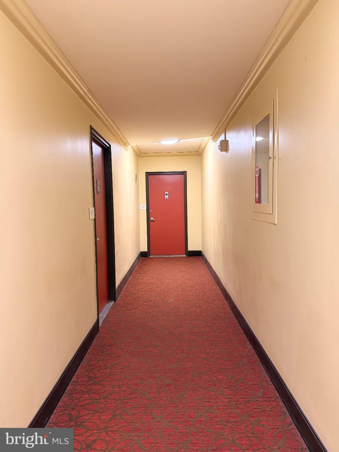 4740 Connecticut Avenue Northwest, Unit 112 Washington, DC 20008 - Photo 17 of 20 Inviting corridor with warm tones and charm.