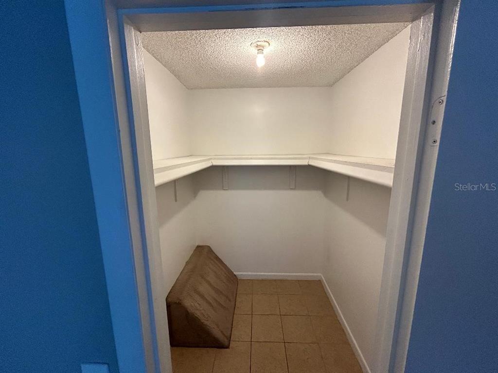 5582 Green Shadows Place, Unit 202 Orlando, FL 32811 - Photo 14 of 19 a view of entryway