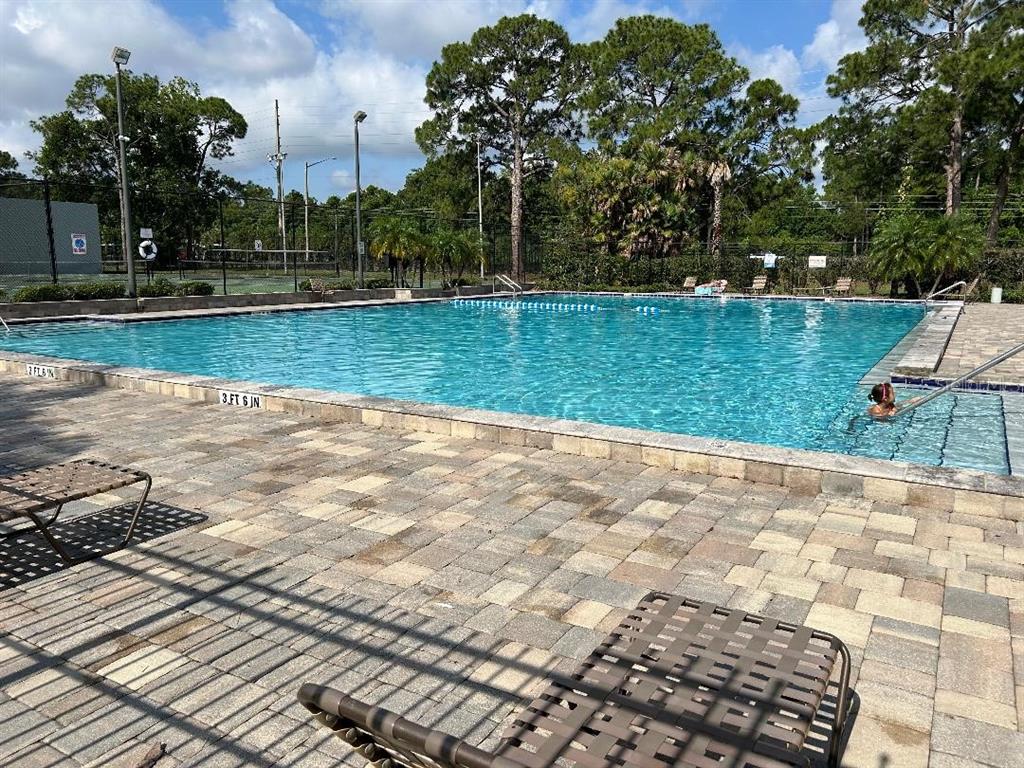 5582 Green Shadows Place, Unit 202 Orlando, FL 32811 - Photo 18 of 19 a view of a lake view