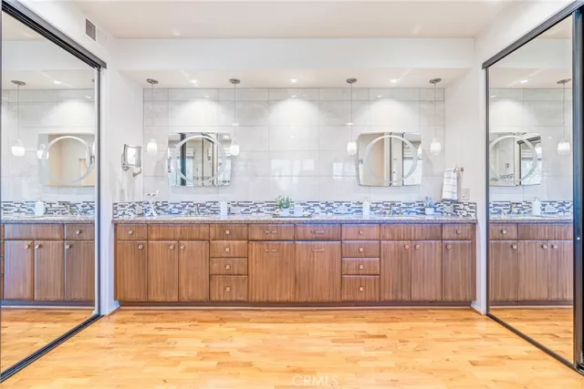 a bedroom with a bed and a table