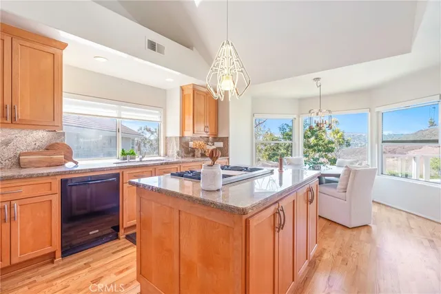a very nice looking kitchen with a large window