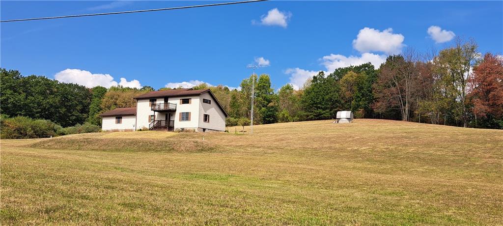 1825 Robertsville Road Punxsutawney, PA 15767 - Photo 4 of 22 a view of a house with a yard