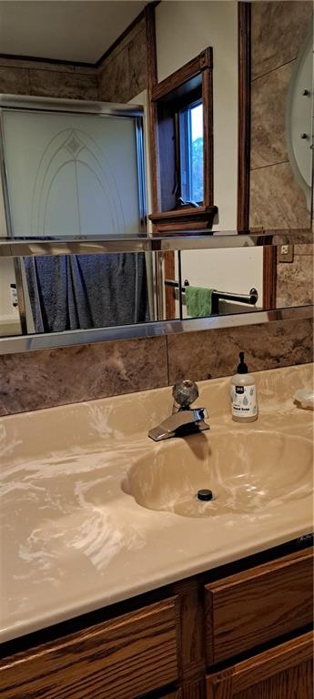 1825 Robertsville Road Punxsutawney, PA 15767 - Photo 8 of 22 a bathroom with a sink and a mirror