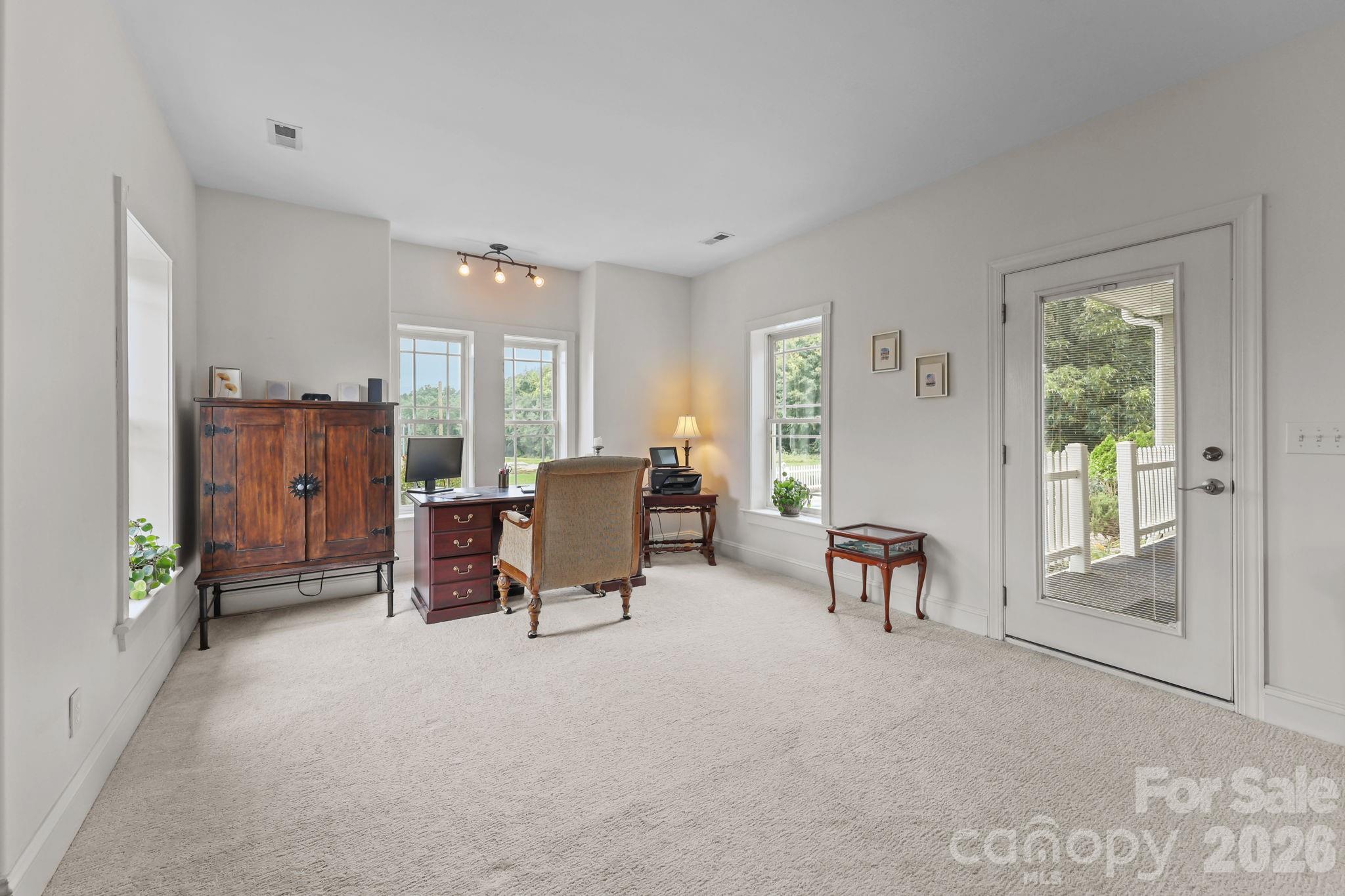 543 Muirfield Way Salisbury, NC 28144 - Photo 25 of 42 a view of a livingroom with furniture and a window