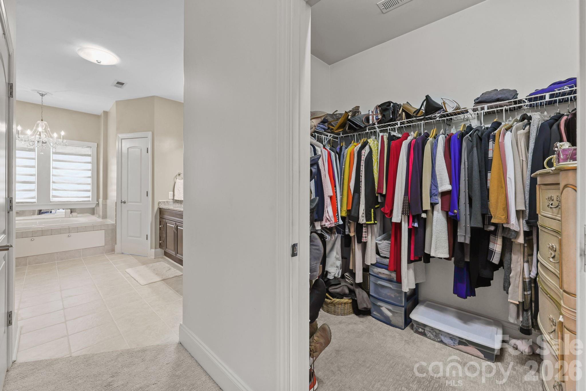 543 Muirfield Way Salisbury, NC 28144 - Photo 30 of 42 a view of walk in closet with clothes