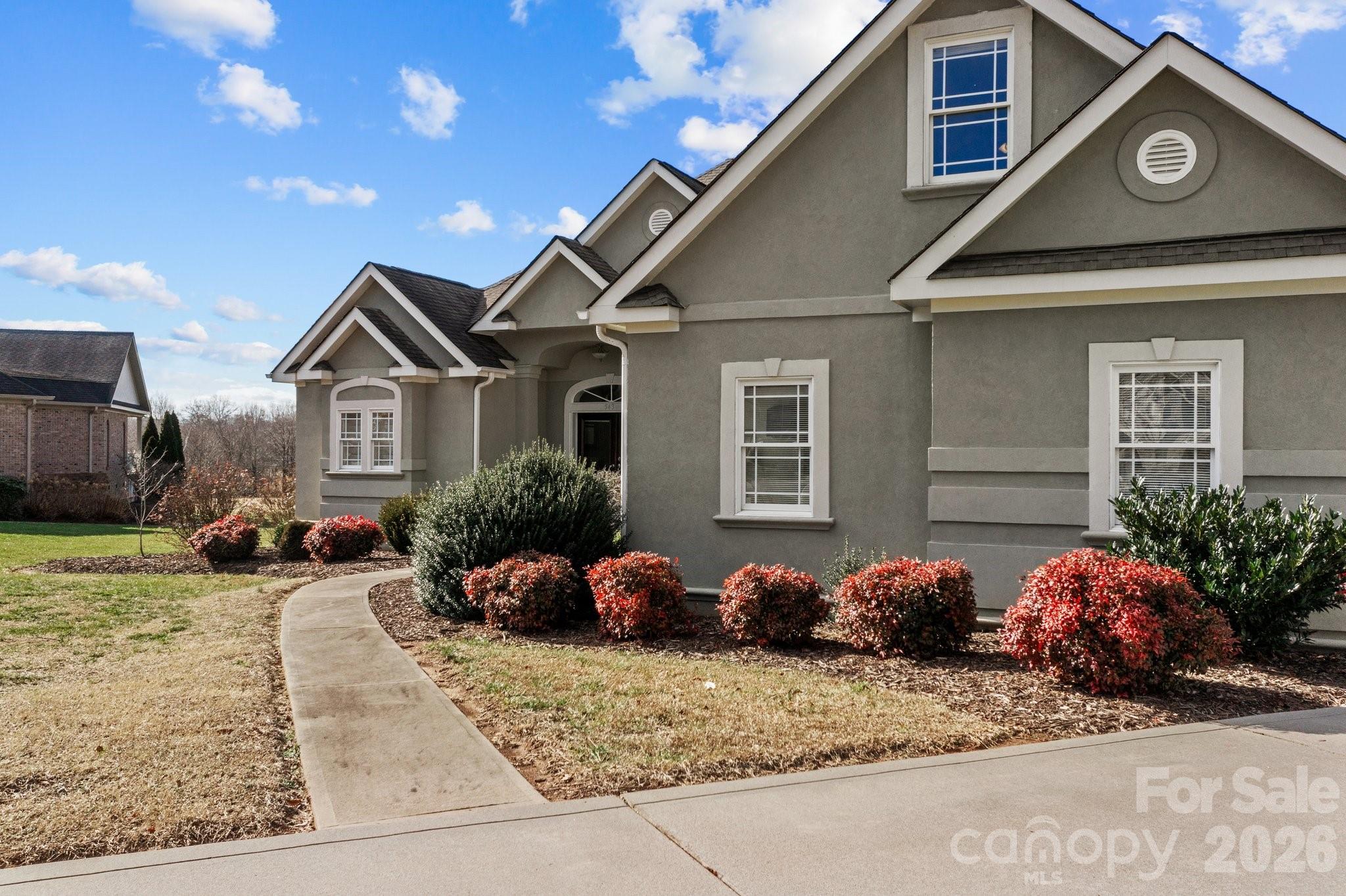 543 Muirfield Way Salisbury, NC 28144 - Photo 4 of 42 a front view of a house with a yard