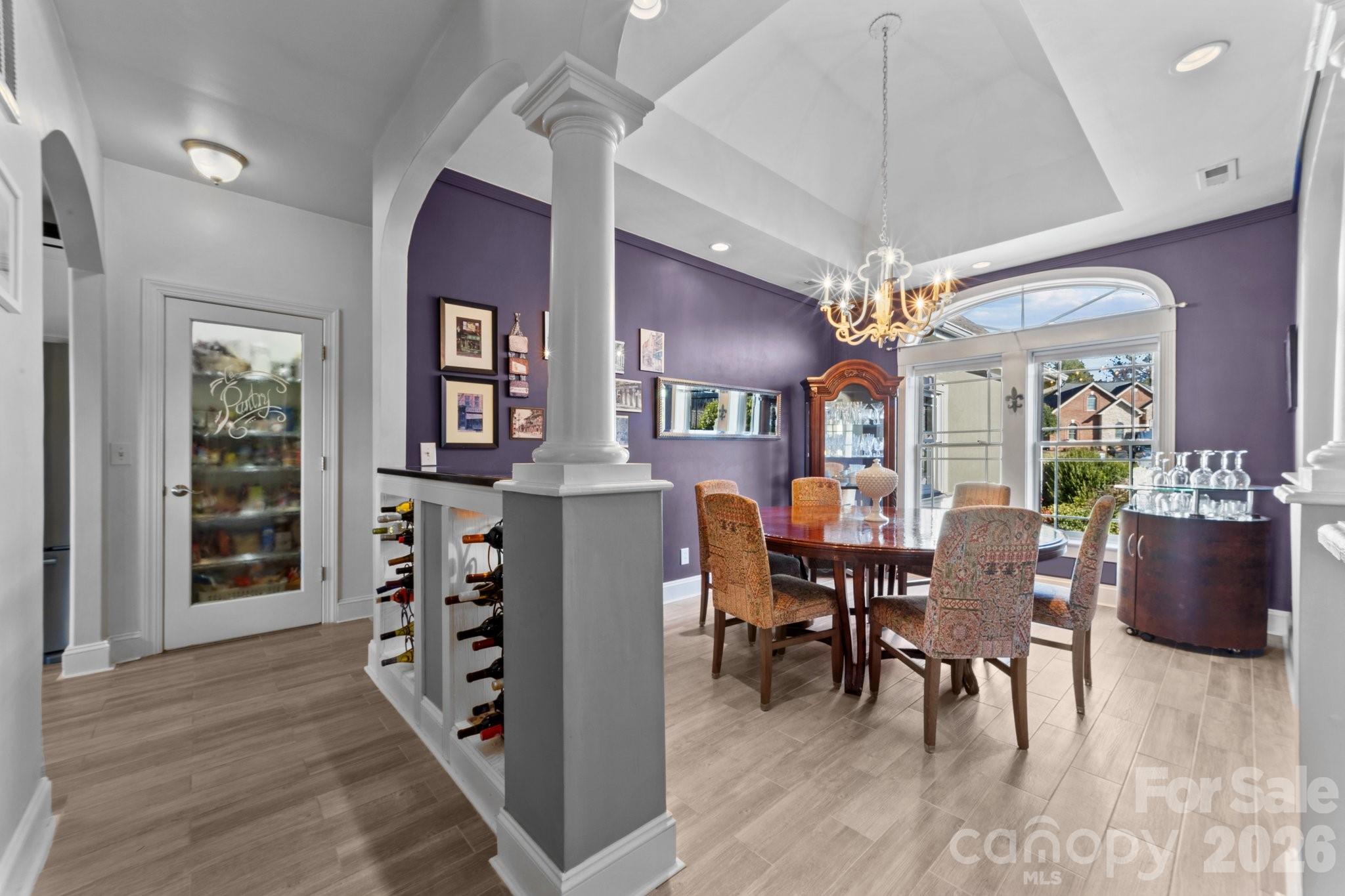 543 Muirfield Way Salisbury, NC 28144 - Photo 7 of 42 a view of a dining room with furniture and chandelier
