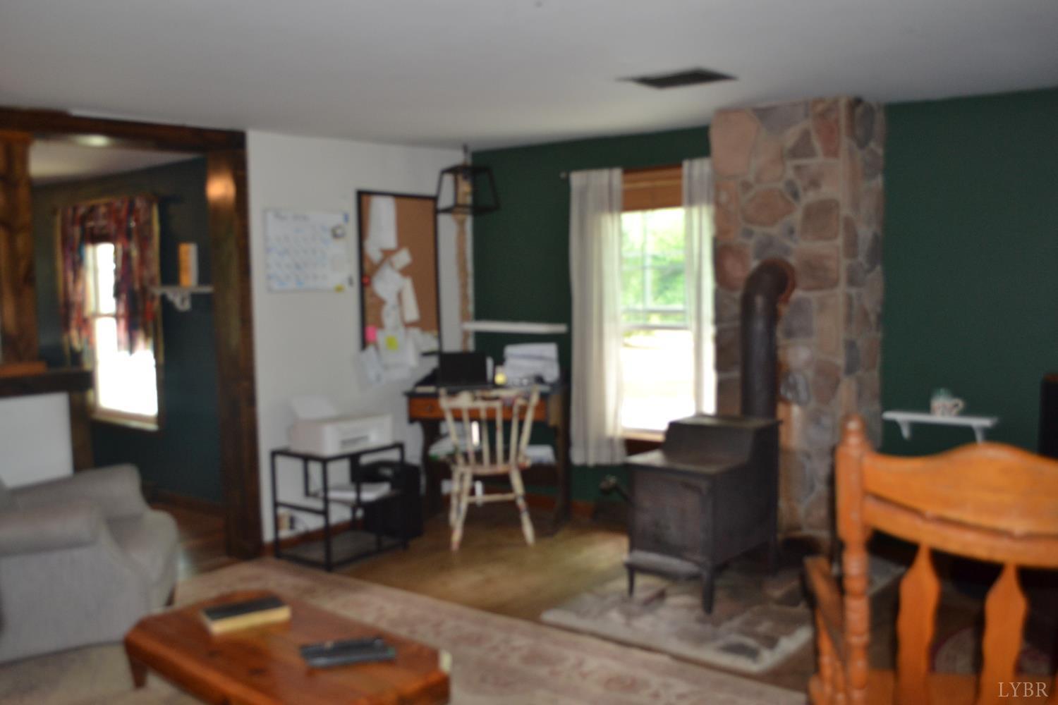 6387 Red House Road Rustburg, VA 24588 - Photo 14 of 38 a view of a livingroom with furniture and a window