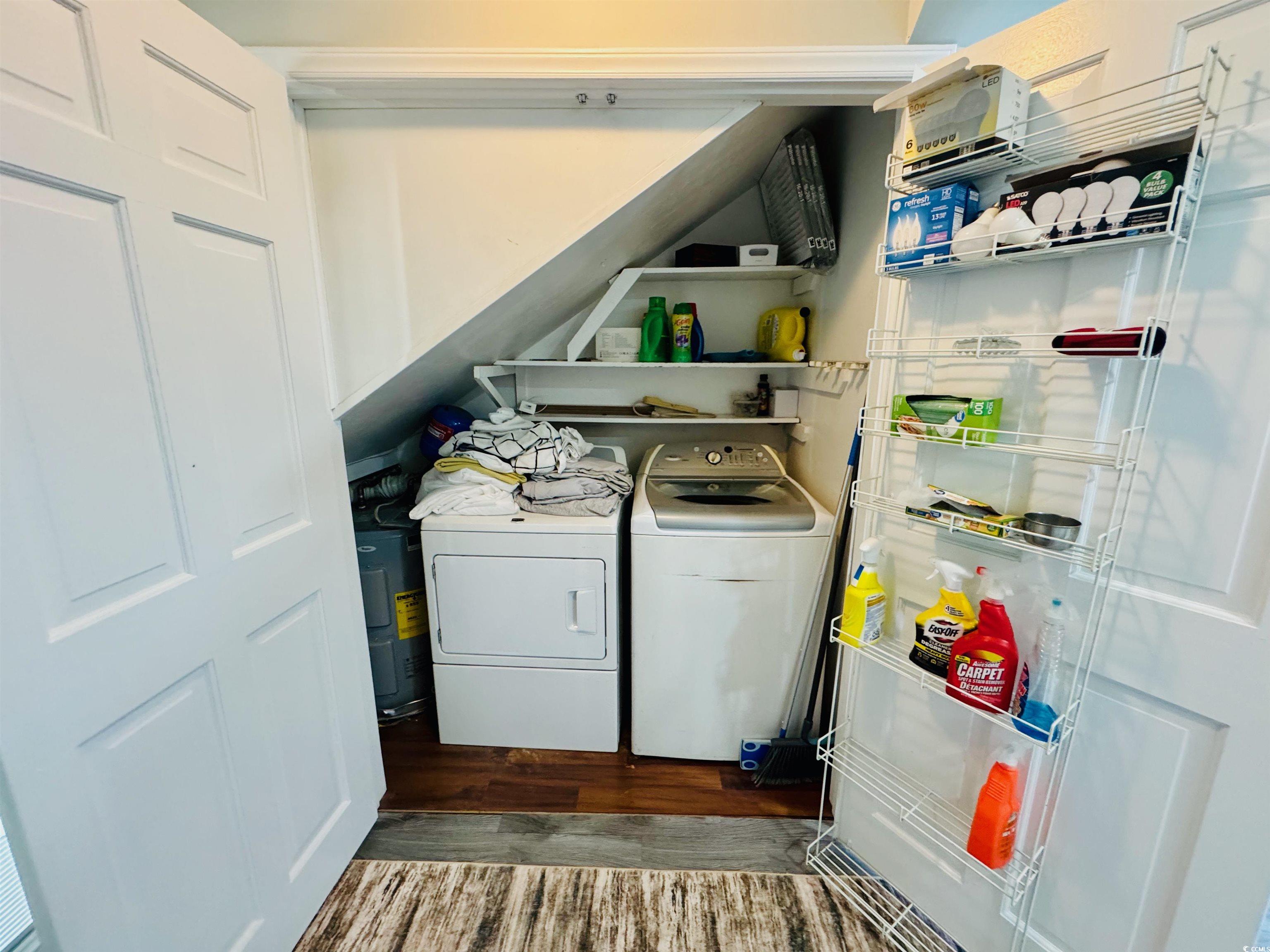 1960 Lake View Circle Surfside Beach, SC 29575 - Photo 18 of 40 Laundry room with dark wood-type flooring, separate washer and dryer, and water heater