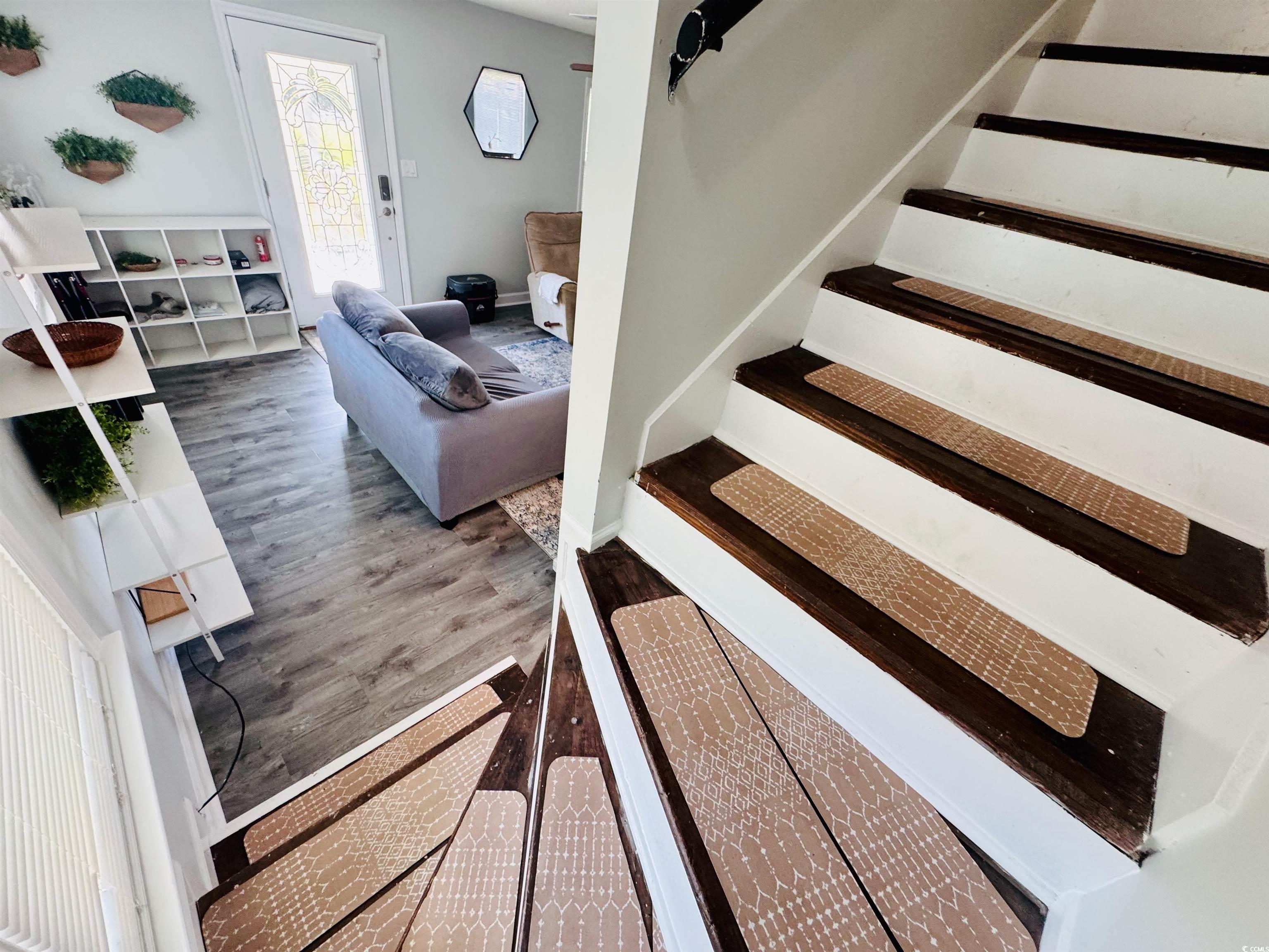 1960 Lake View Circle Surfside Beach, SC 29575 - Photo 25 of 40 Stairway with wood finished floors