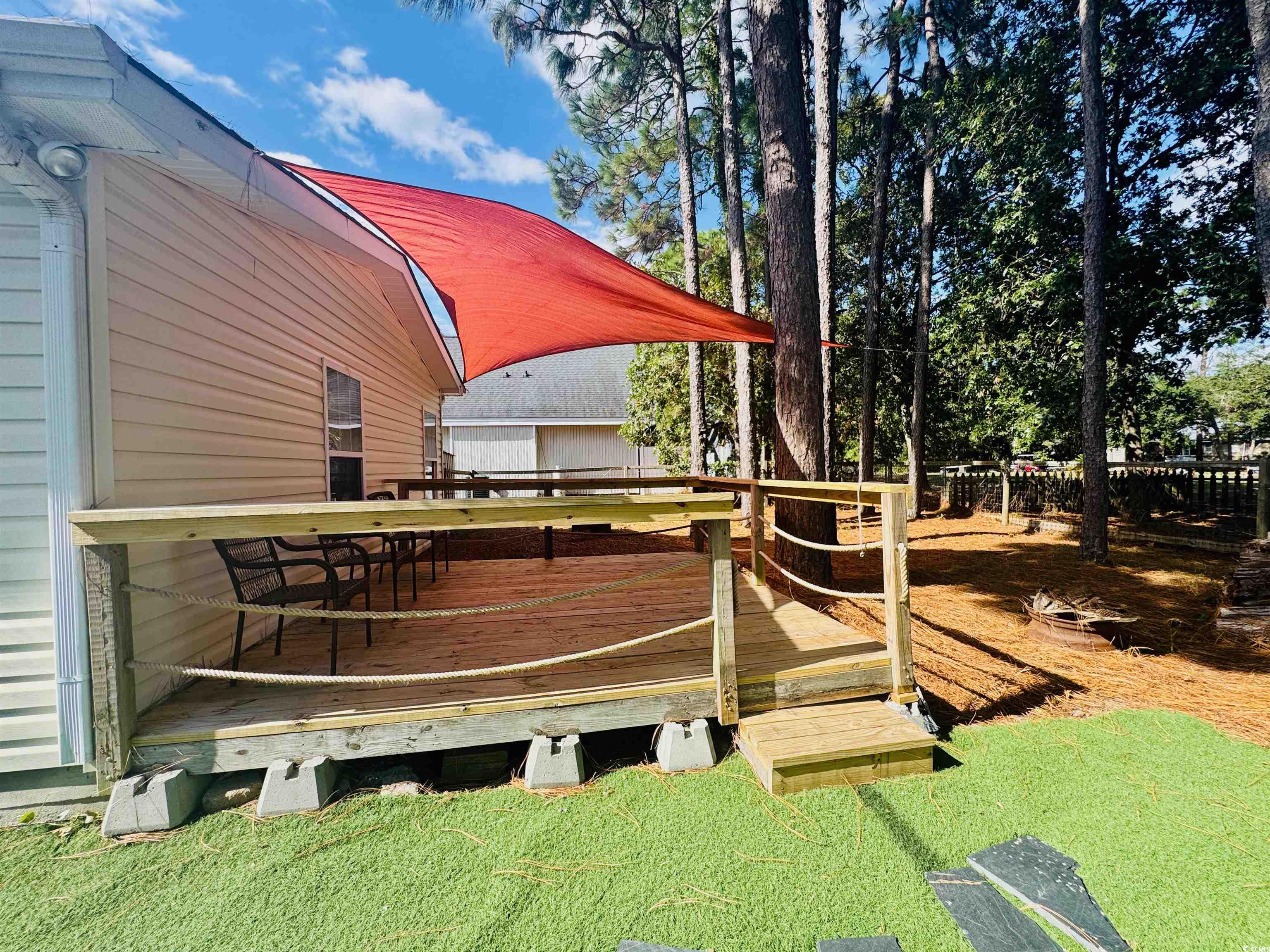 1960 Lake View Circle Surfside Beach, SC 29575 - Photo 37 of 40 Wooden terrace featuring a fenced in back yard