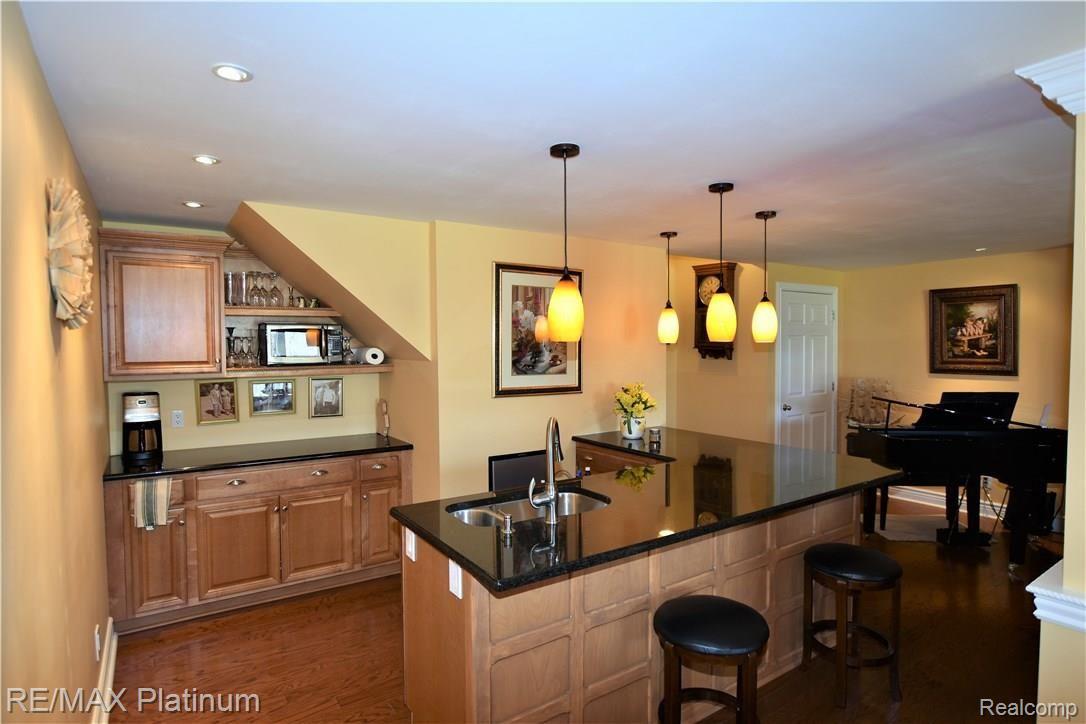 104 Sedum Road Howell, MI 48843 - Photo 24 of 33 Granite Wet Bar
