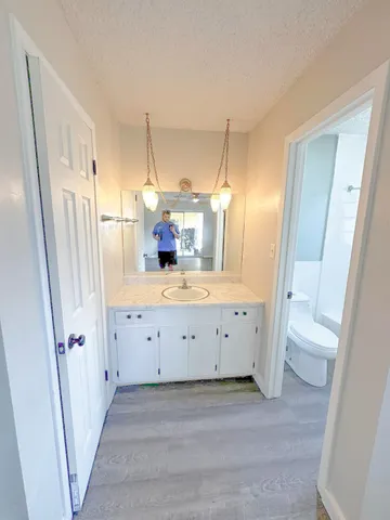 a view of a kitchen with cabinets