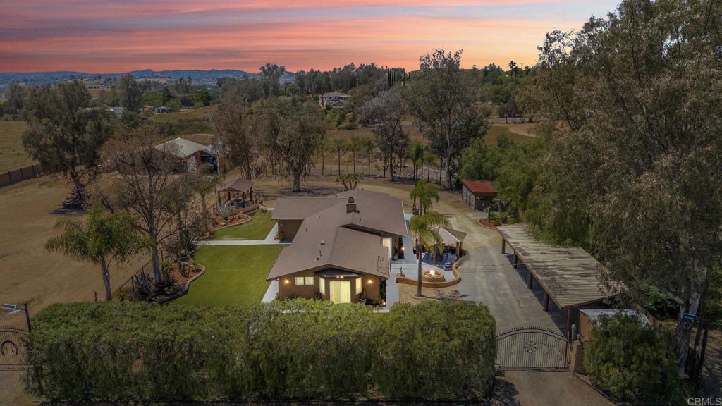 30265 Miller Road Valley Center, CA 92082 - Photo 1 of 56 a view of a swimming pool with a yard