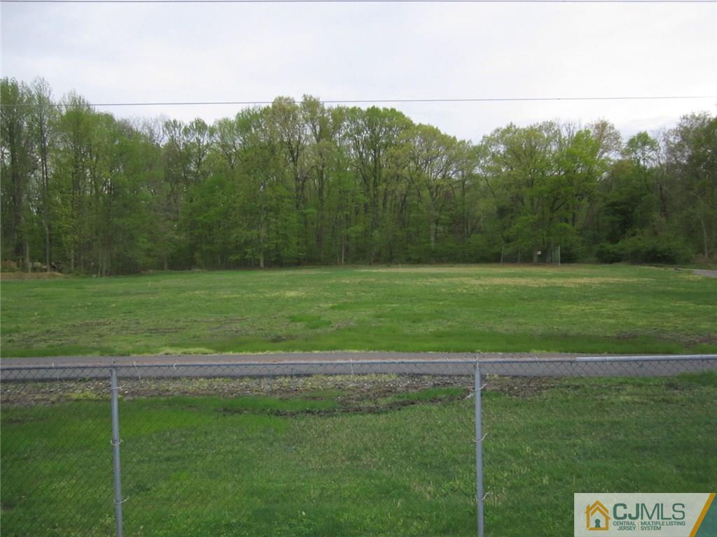 36 Whitman Road, Unit 1 North Brunswick, NJ 08902 - Photo 2 of 18 a view of a field with a small yard