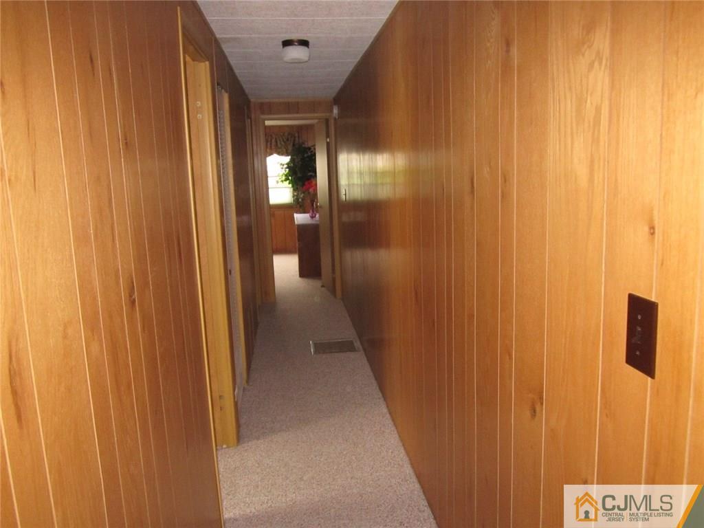 36 Whitman Road, Unit 1 North Brunswick, NJ 08902 - Photo 9 of 18 a view of hallway with stairs
