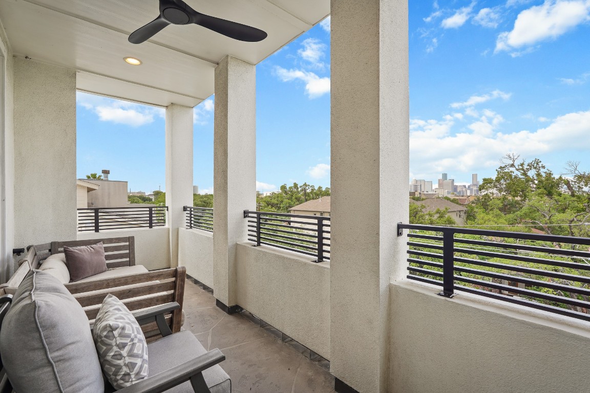 1812 Rosedale Street, Unit A Houston, TX 77004 - Photo 16 of 21 Private balcony with unobstructed skyline views—spacious enough for full outdoor living.