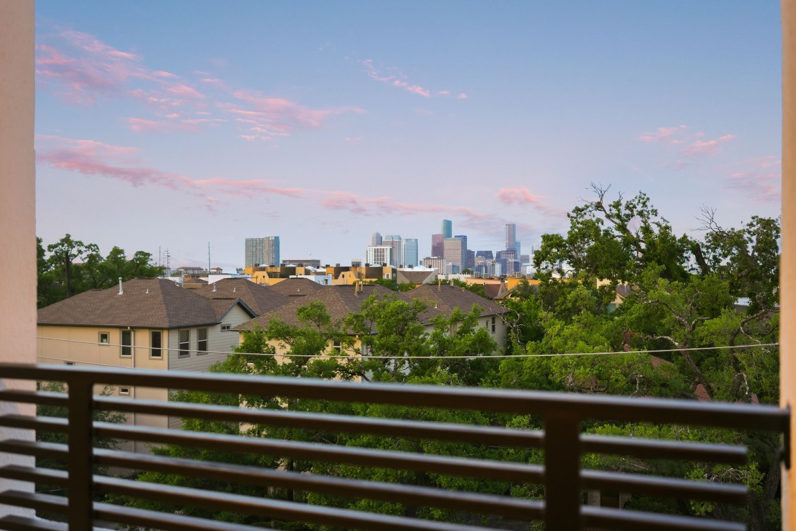 1812 Rosedale Street, Unit A Houston, TX 77004 - Photo 2 of 21 Unobstructed downtown views from your fourth-level balcony—your daily backdrop, day to night.