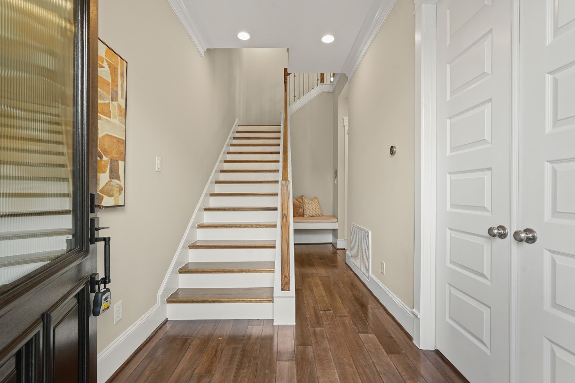 1812 Rosedale Street, Unit A Houston, TX 77004 - Photo 3 of 21 Architectural entry with clean lines and natural light, featuring double doors to a private office.