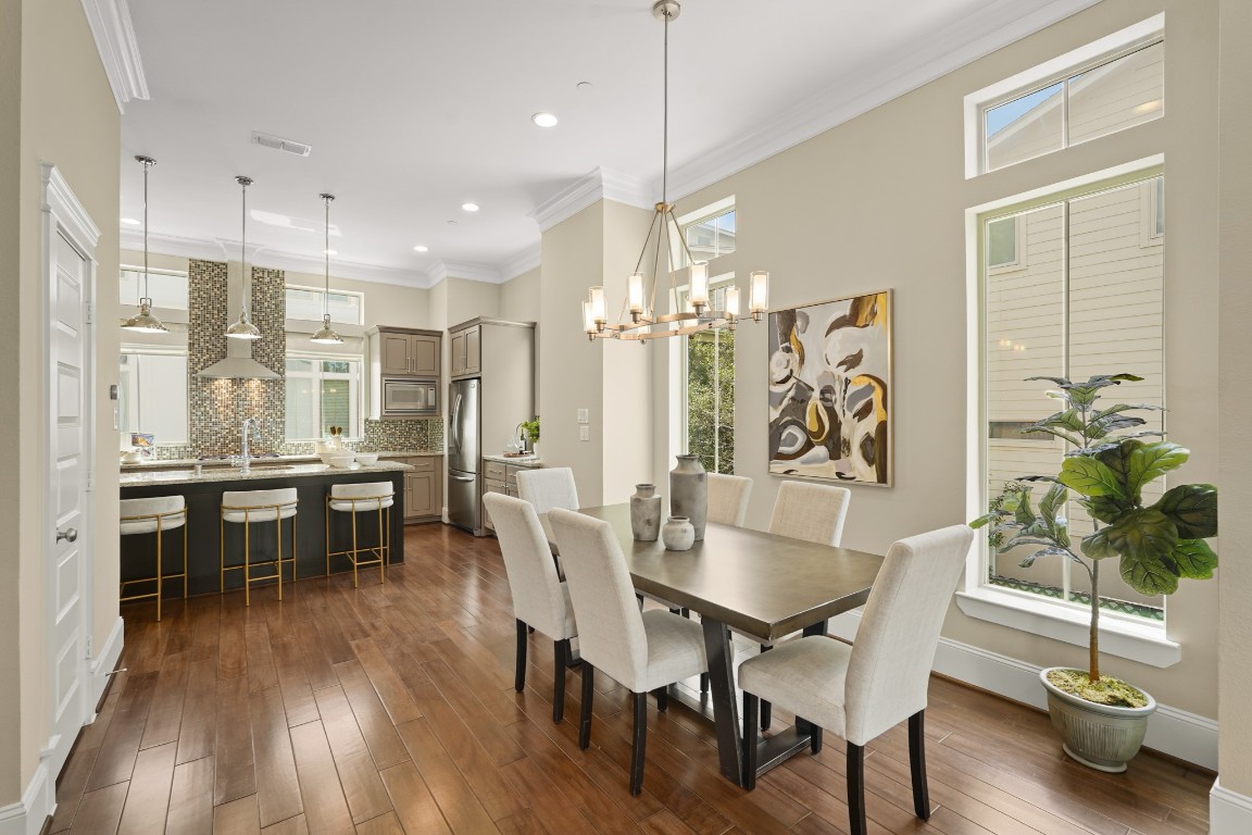 1812 Rosedale Street, Unit A Houston, TX 77004 - Photo 7 of 21 Open-concept living—kitchen and dining seamlessly connected for effortless flow.
