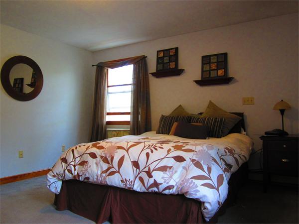 30 Sandy Beach Road Plymouth, MA 02360 - Photo 13 of 26 a bedroom with a bed and a window