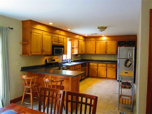30 Sandy Beach Road Plymouth, MA 02360 - Photo 5 of 26 a kitchen with a sink appliances and cabinets
