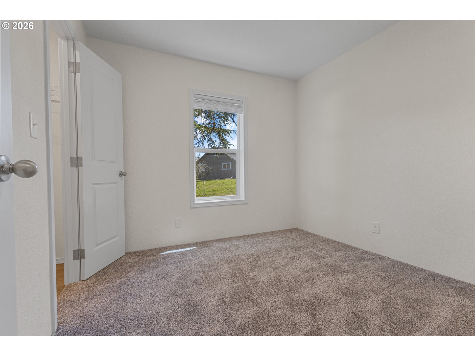 365 Mountain View Road Sweet Home, OR 97386 - Photo 15 of 32 a view of an empty room with a window