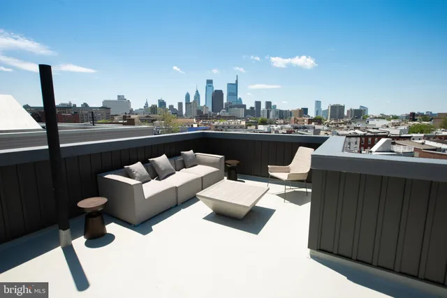 a view of roof deck with seating space