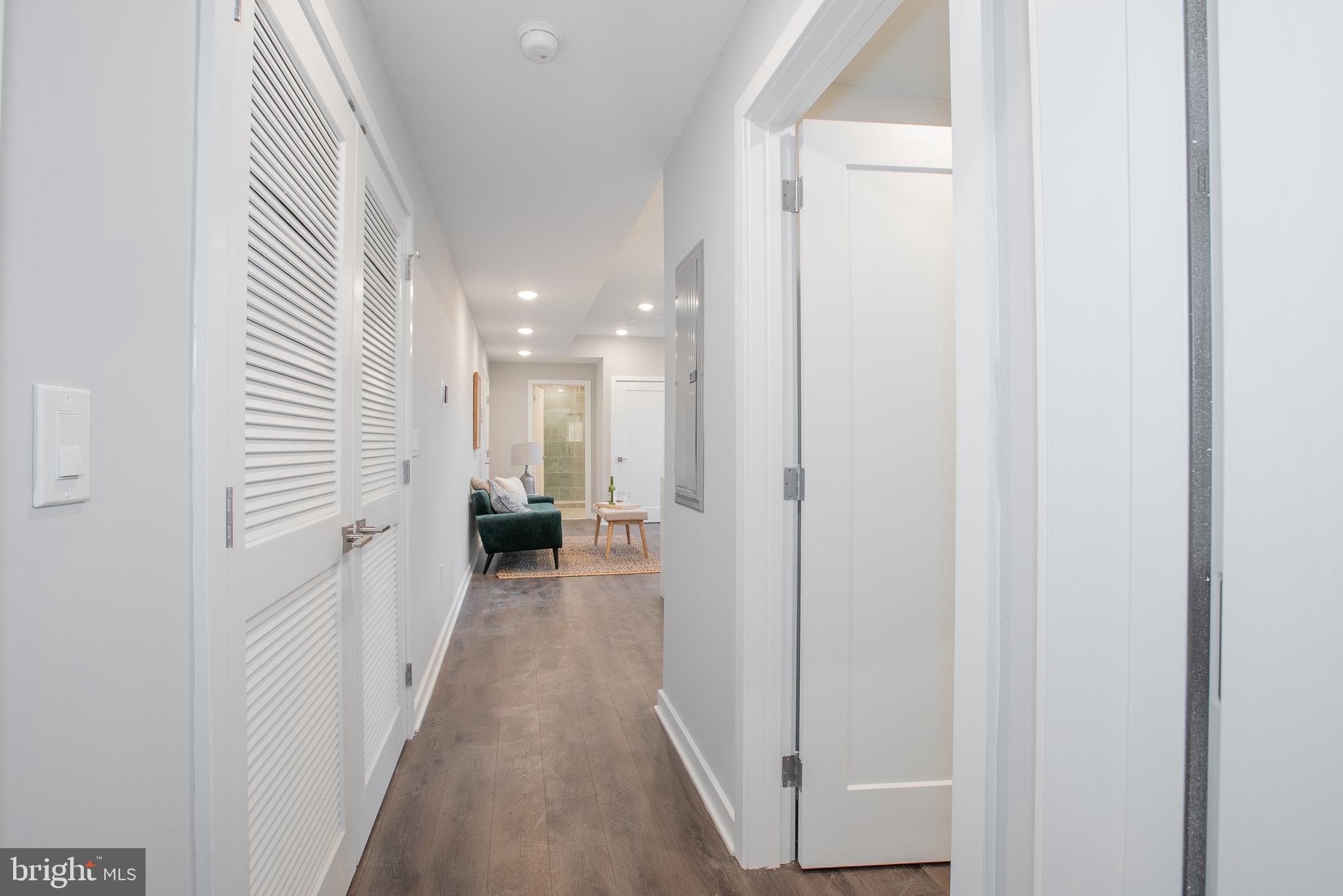 1534 Ridge Avenue, Unit 502 Philadelphia, PA 19130 - Photo 10 of 20 a view of a hallway with a white walls