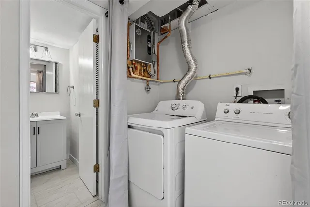 a utility room with dryer and washer