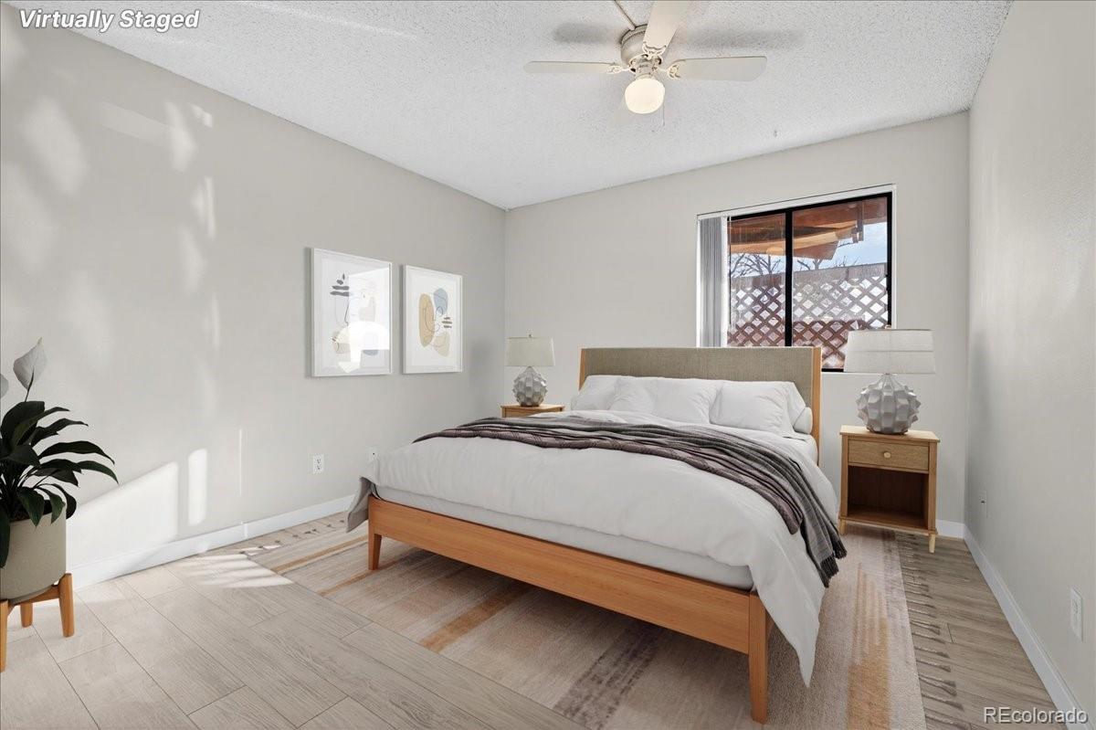 4681 South Decatur Street, Unit 124 Englewood, CO 80110 - Photo 3 of 33 a bedroom with a bed and a window