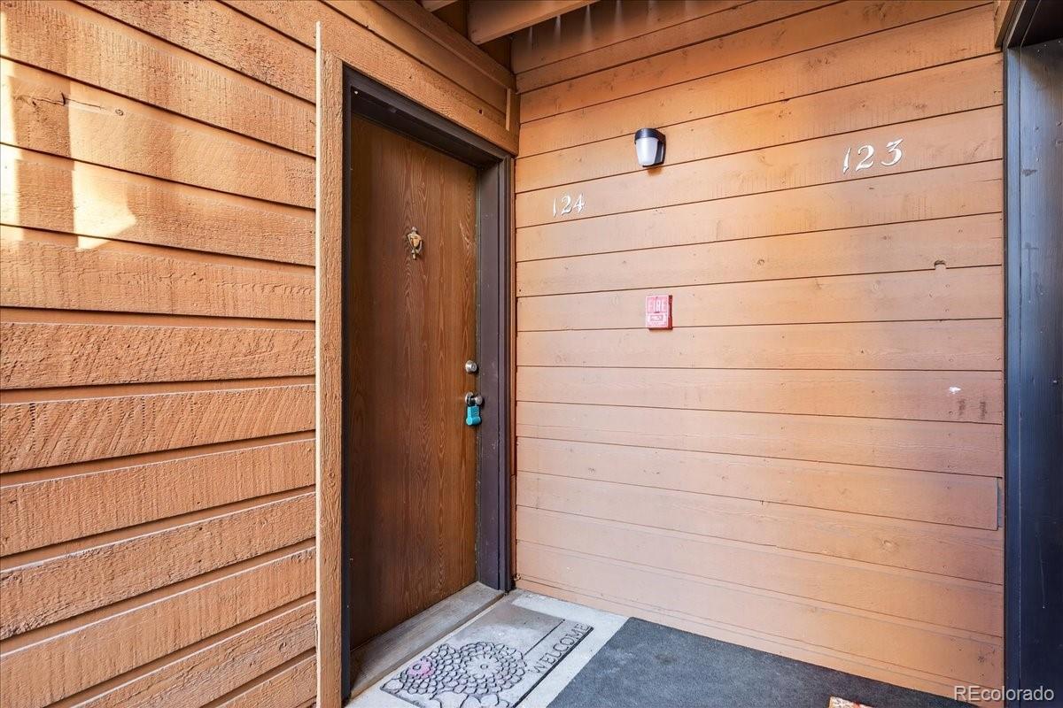 4681 South Decatur Street, Unit 124 Englewood, CO 80110 - Photo 8 of 33 a view of a wooden door