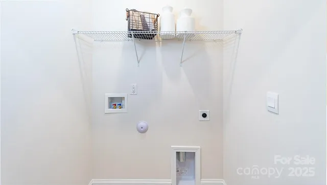 a picture of a bathroom with a shower