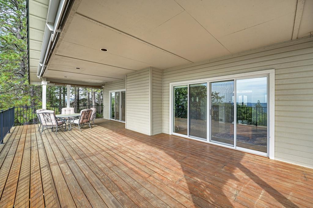 2358 Deer Ravine Court Cool, CA 95614 - Photo 49 of 63 deck featuring outdoor dining area