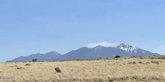 a view of mountains and mountain in the background