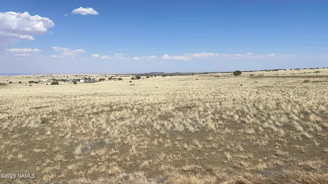 a view of an ocean and a mountain