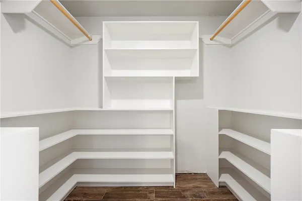 a view of an empty walk in closet