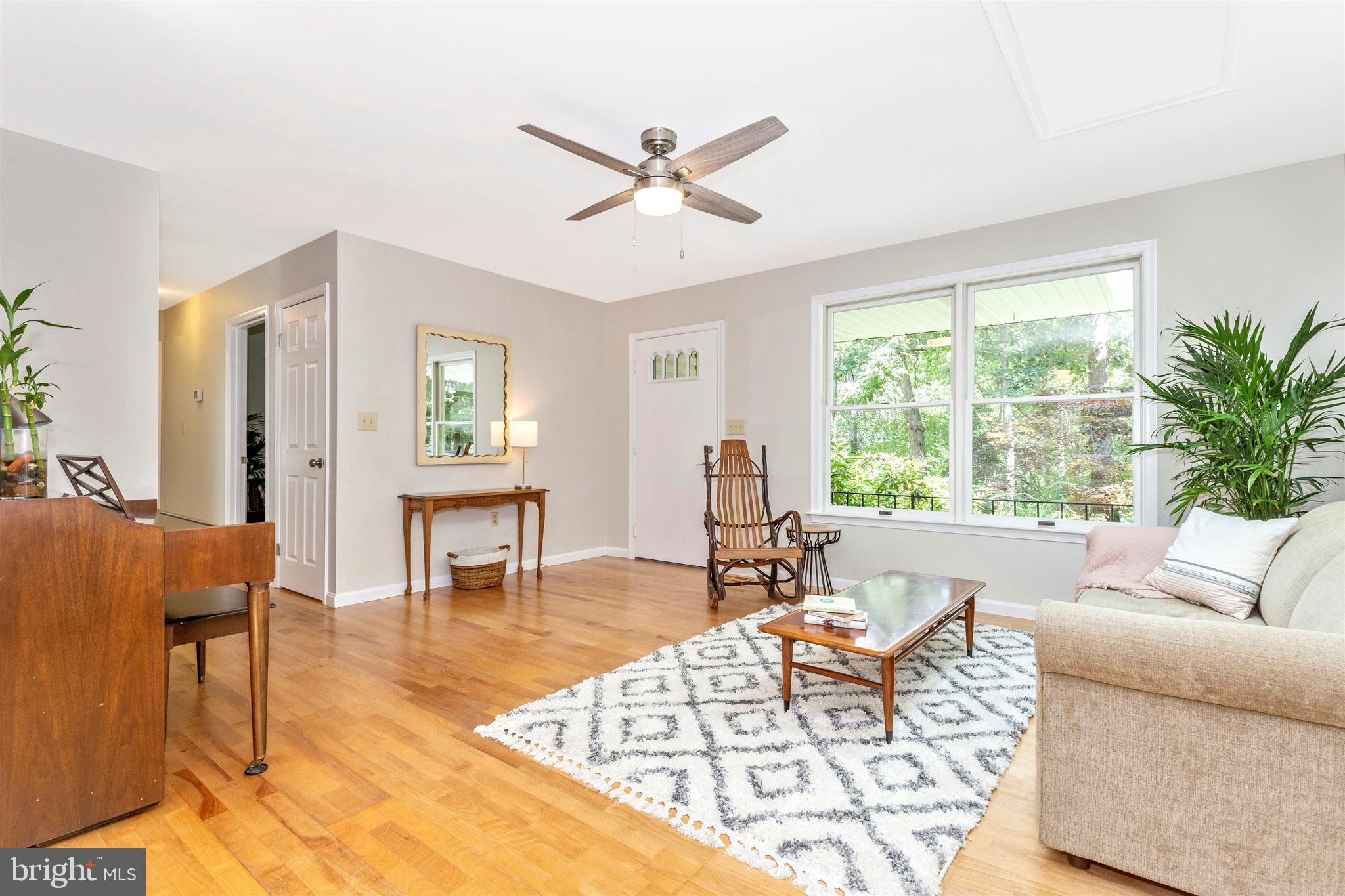 3223 Hoopers Delight Road New Windsor, MD 21776 - Photo 8 of 85 Bright living room new ceiling fan