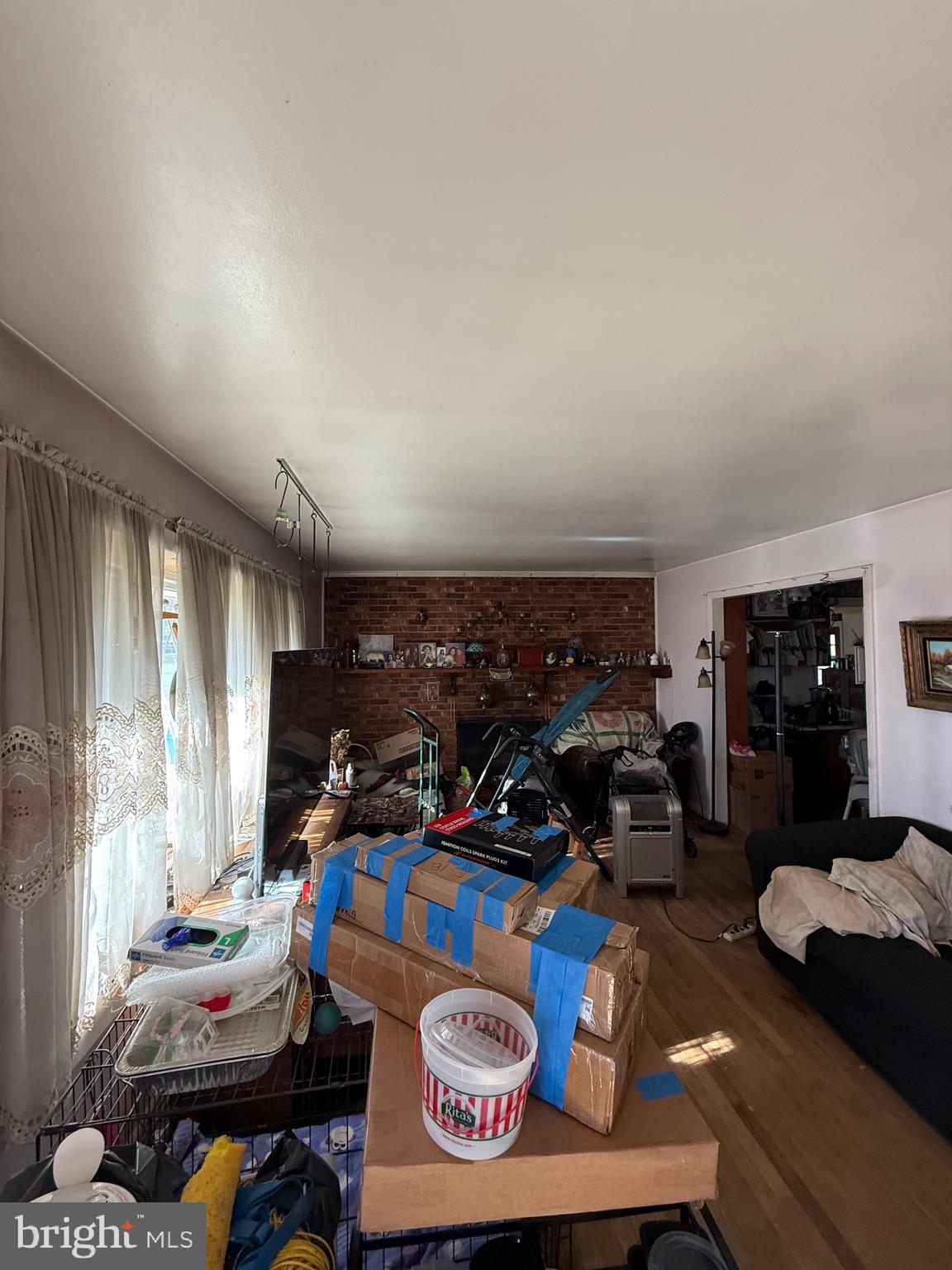 1400 Spencerville Road Spencerville, MD 20868 - Photo 3 of 16 a bedroom with furniture and a window