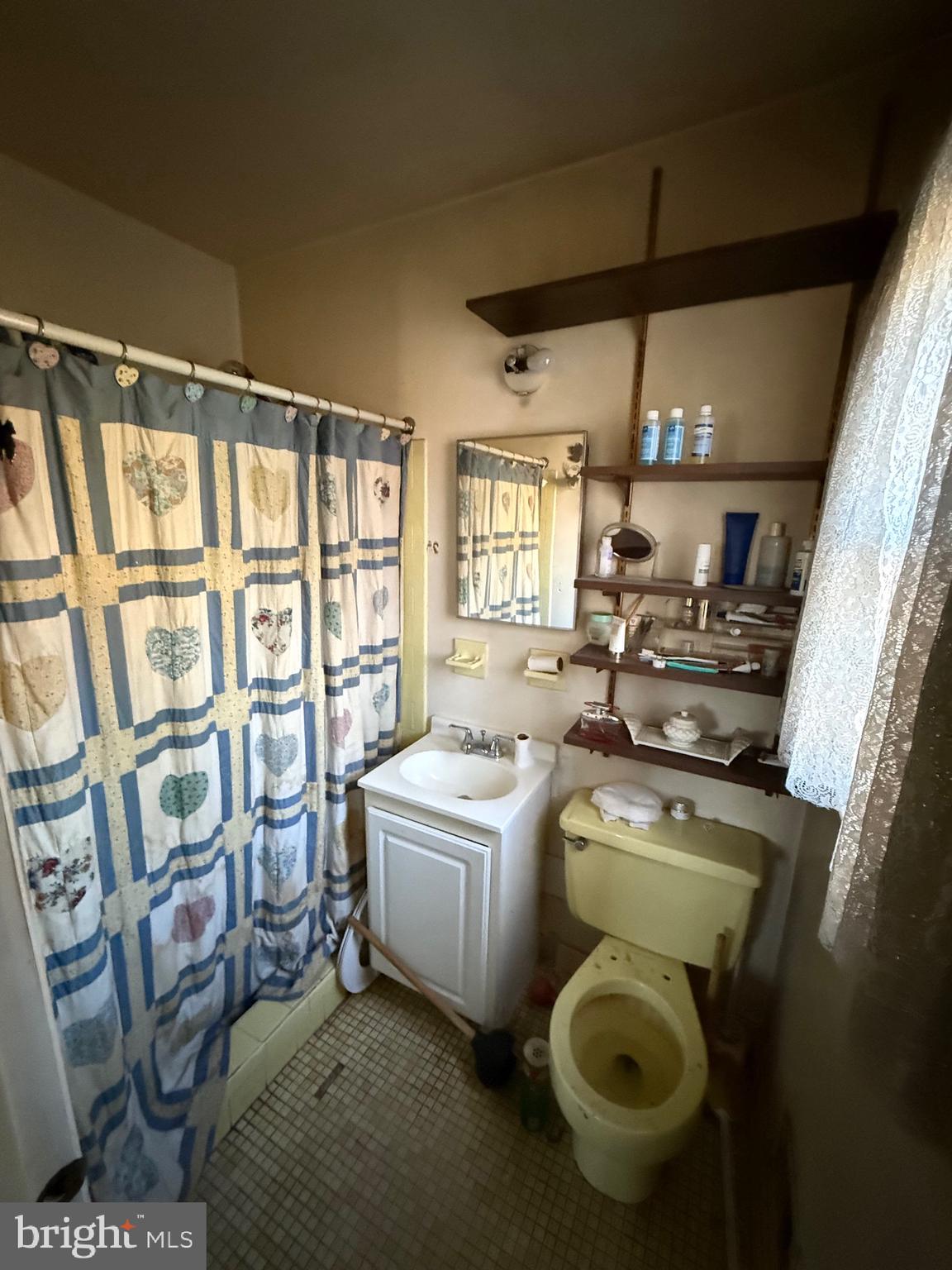 1400 Spencerville Road Spencerville, MD 20868 - Photo 8 of 16 a room with water heater and a washer dryer