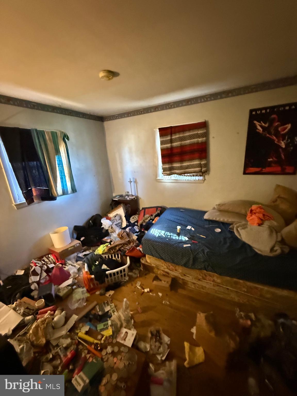 1400 Spencerville Road Spencerville, MD 20868 - Photo 9 of 16 a living room with hard wood flooring and a couch