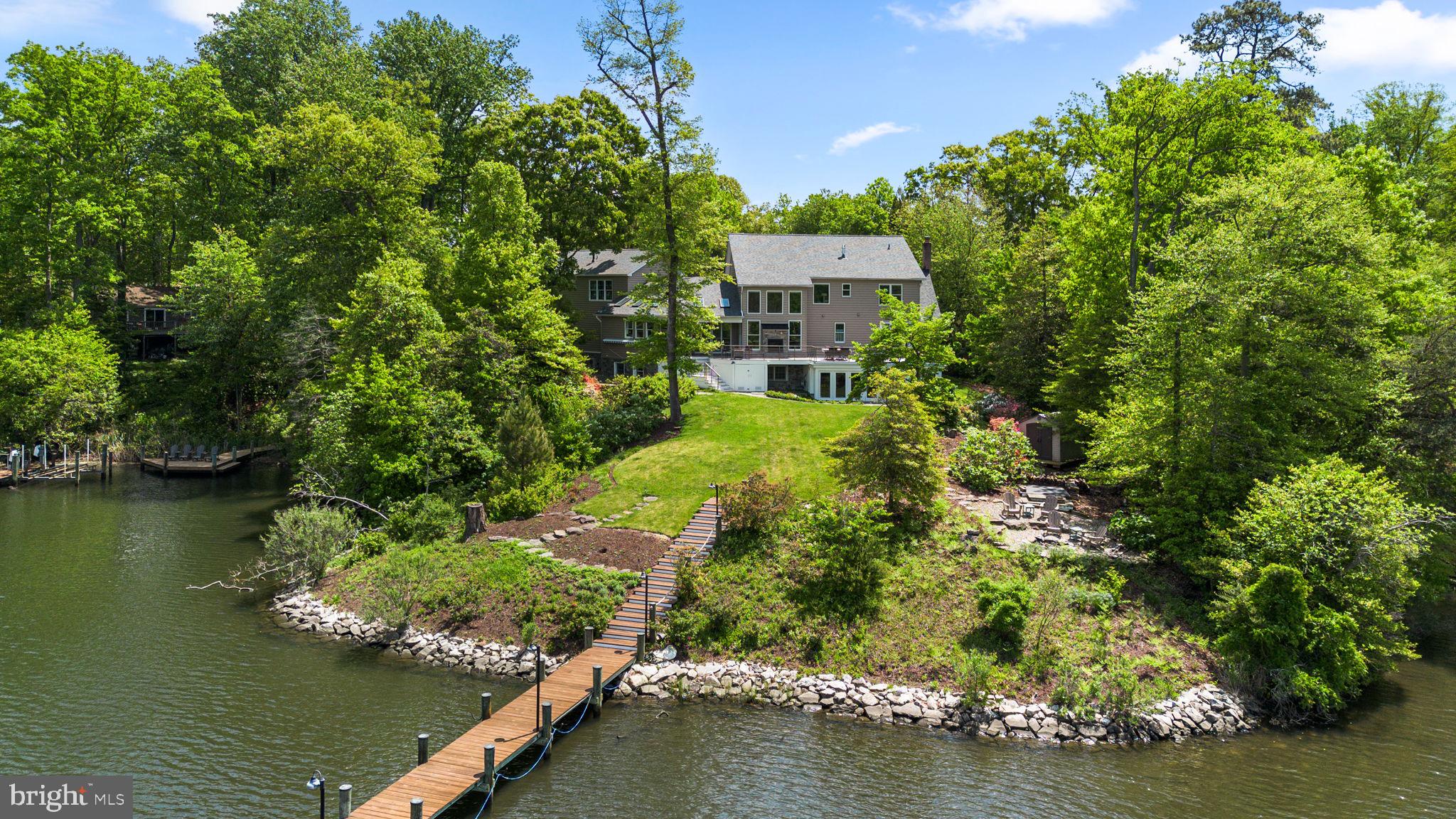798 Creek View Road Severna Park, MD 21146 - Photo 65 of 72 an aerial view of a house with a yard lake house and outdoor seating