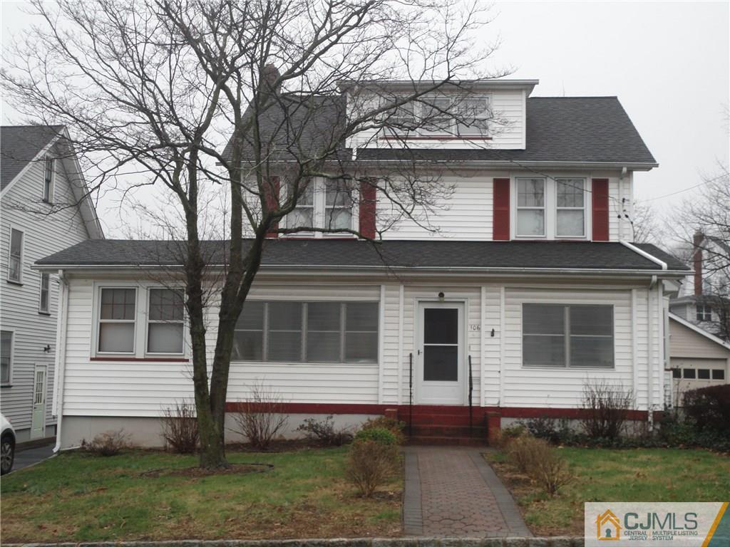 106 Walker Road West Orange, NJ 07052 - Photo 1 of 25 a front view of a house with a yard