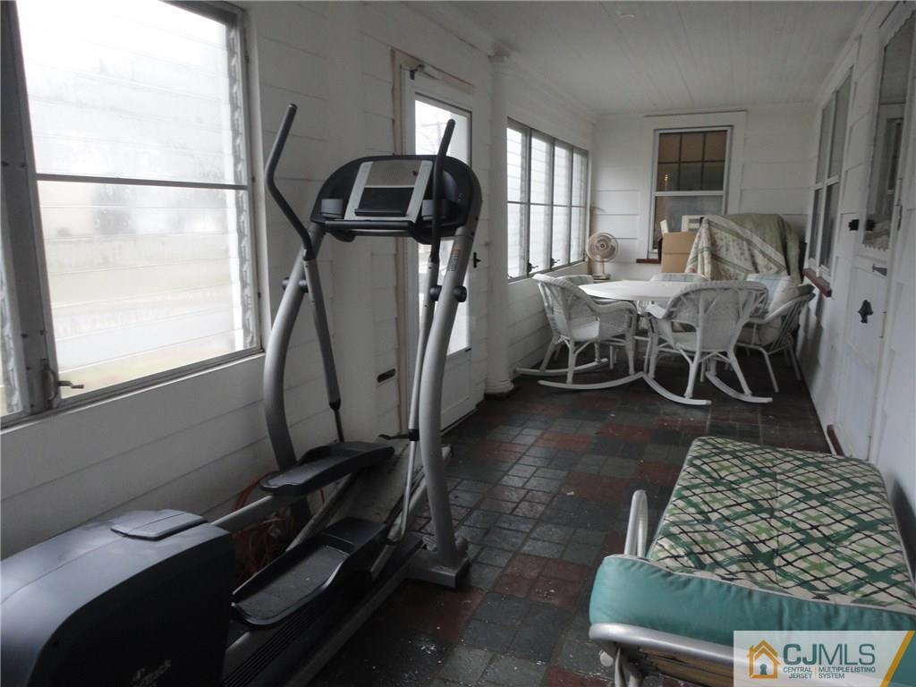 106 Walker Road West Orange, NJ 07052 - Photo 2 of 25 a living room with furniture a rug and a window